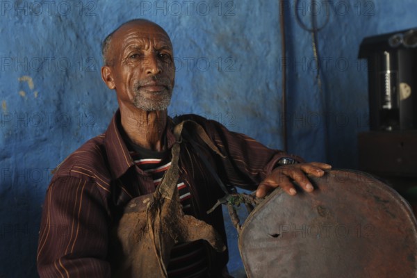 Elderly man in characteristic room, thoughtful in Lalibela, Lalibela, null