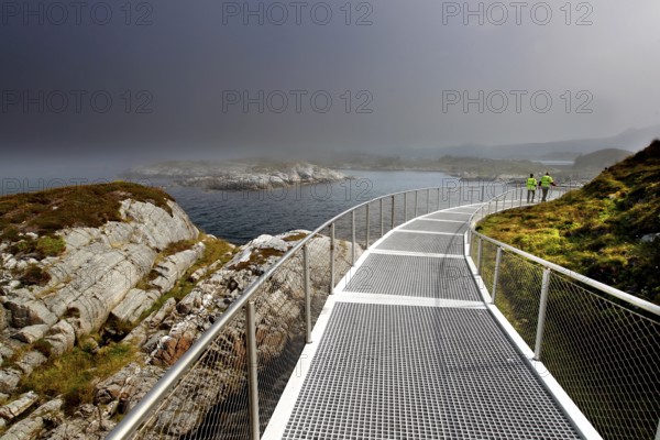 Eldhusøya viewpoint along Atlanterhavsveien with sea views and dramatic clouds, Lauvøyford, Møre og