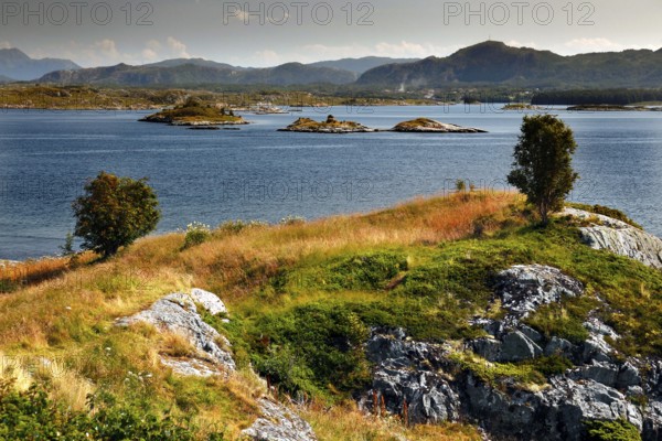 Geitøya archipelago island along Atlanterhavsveien with views of grasslands and the sea,