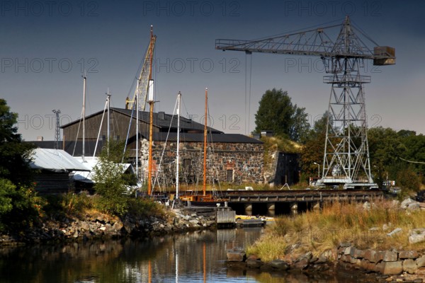 Shipyard and dry dock in Suomenlinna, Helsinki, with crane and rustic environment, Suomenlinna,