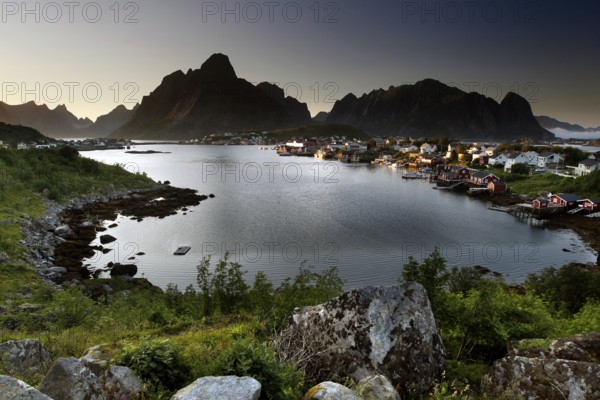 Reine and Hamnøay, surrounded by lakes and the dramatic Lofoten mountains, Reine, Moskenesøy,