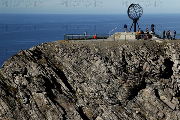 Panorama of cliffs at the North Cape with the globe and sea in the background, North Cape,