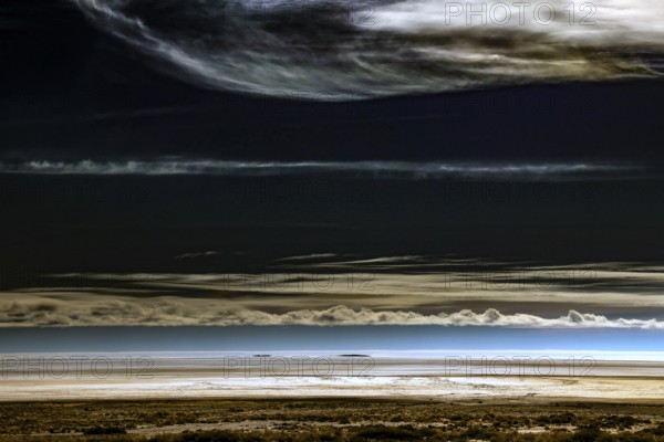 Lake Eyre in Australia with dramatic clouds and vast desert landscape, Lake Eyre, South Australia,
