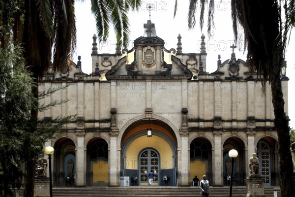Impressive façade of the Trinity Church in Addis Ababa, framed by palm trees, Addis Ababa, null,