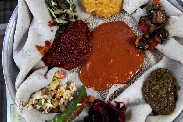 Diverse vegetarian dishes on Injera in Addis Ababa, Addis Ababa, Addis Ababa, Ethiopia