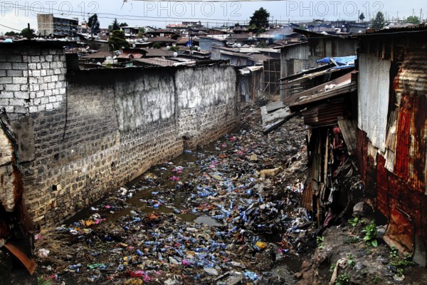 Dilapidated street full of trash and abandoned buildings in the Mercato of Addis Ababa, Addis