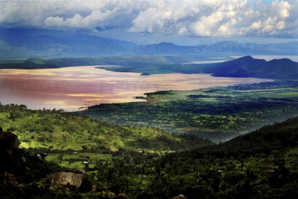 Panorama of Lake Chamo with surrounding green hills and dramatic cloud formations, Lake Chamo,