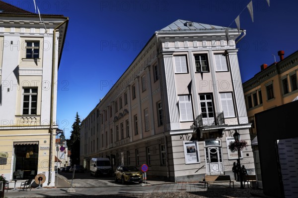 The Leaning House in the old town of Tartu shows distinctive architectural styles and clear blue
