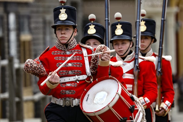 Soldiers in historic red uniforms with a drum in Sovereign Hill, Ballarat, Ballarat, Victoria,