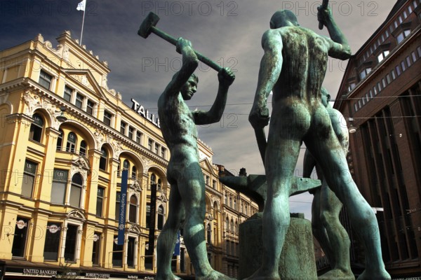 Monument to the Three Blacksmiths at the corner of Pohjoisesplanadi and Mannerheiminti in Helsinki,