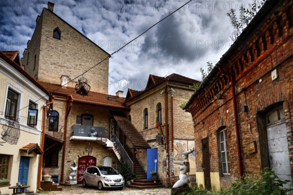 Courtyard view with old brick building and art studio in Vilnius' Užupis district, Vilnius, Užupis,