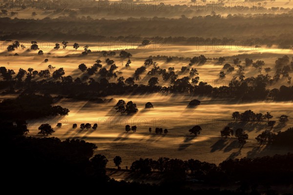 Evening landscape view of Boroka Lookout in the Grampian Mountains with illuminated fields and