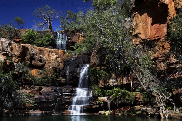 Impressive waterfall amidst pristine rocky landscape of Galvans Gorge, Galvans Gorge, Kimberley,