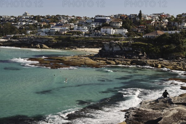 Panorama of Tamarama Beach with cliffs and settlement in Sydney, Sydney, Australia