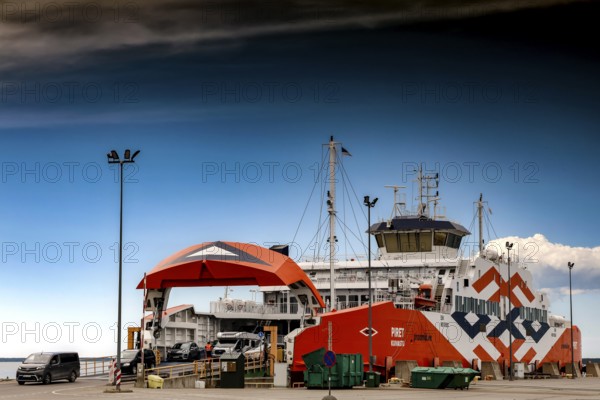 Ferry at a port on Muhu Island under clear skies, Muhu, Estonia
