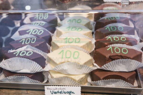Baumkuchen with the logo 100 is on display at the Green Week at the exhibition center in Berlin on