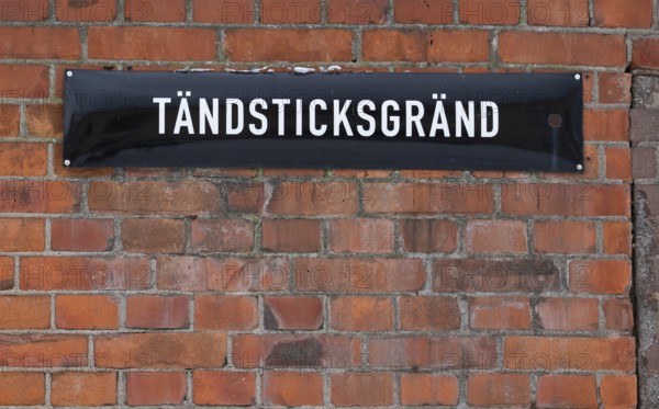 Street sign Tändsticksgränd on brick wall, Tändsticksmuseet match museum or match museum,