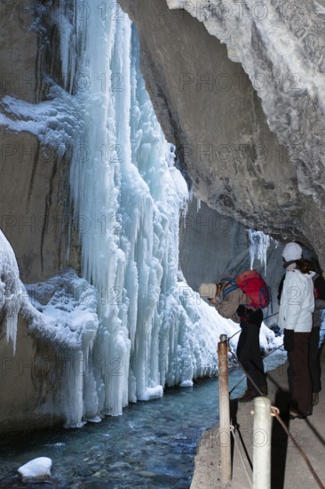 Photographer in the Partnachklamm gorge near Garmisch-Partenkirchen, icicles, Werdenfelser Land,