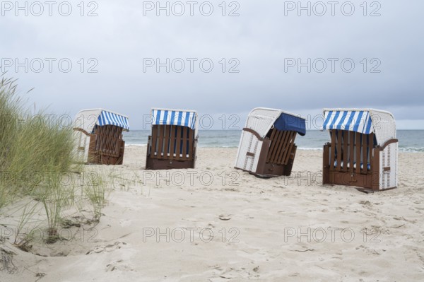 Abandoned beach chairs on sandy beach, Baltic resort Göhren, Baltic Sea, Rügen island,