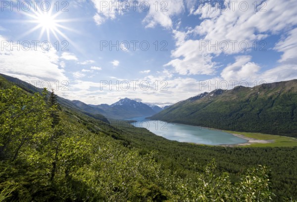 View of blue lake and mountains on Twin Peaks Trail, Sun Star, Eklutna Lake, Chugach Mountains,