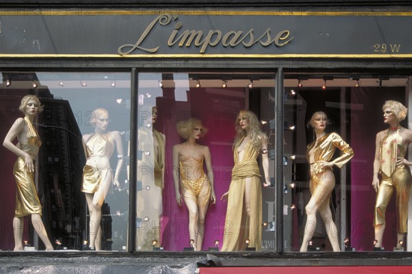 Window mannequins at Limpasse Fashion Boutique, New York City, USA