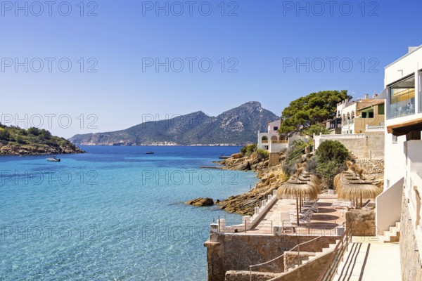 House with terraces on the shores of the Mediterranean sea with a scenics view to the sea a sunny