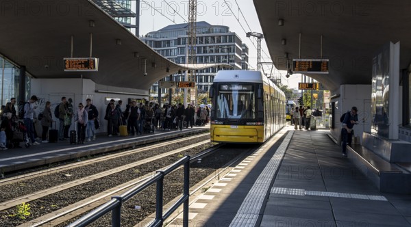 Berlin road traffic with buses, trams and pedestrians at and around the main train station, Berlin,