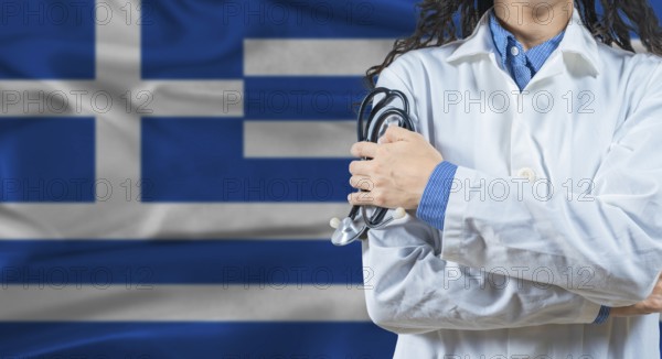 Healthcare professional with Greece flag background. Professional doctor holding stethoscope on
