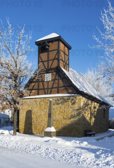 Timbered church in snowcoat with clear blue sky in background, Old Chapel, 15th century, snow,