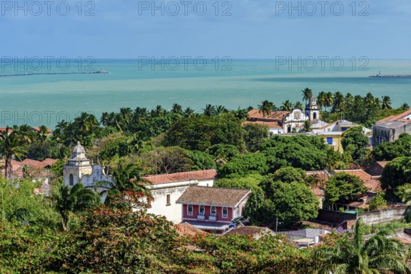 Old mansions and churches nestled among the vegetation in the historic city of Olinda, Olinda,