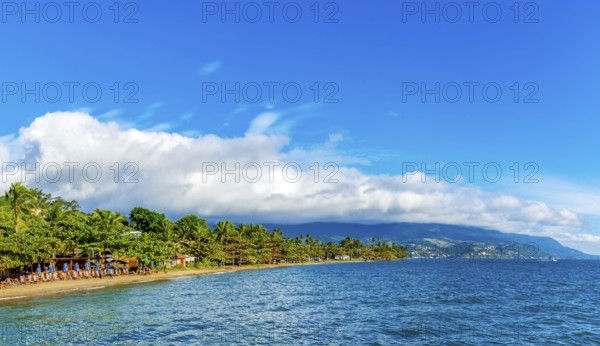 The urban coastline of Ilhabela meets the sea, forest, and mountains of São Paulo's coast,