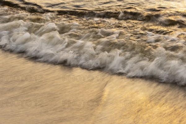 Waves at sunset on the west beach of Fischland-Darß-Zingst, Baltic Sea, Ahrenshoop,