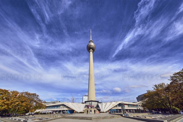 Berlin TV Tower, square, stone staircase, general architecture, pedestrians as accessories, trees,