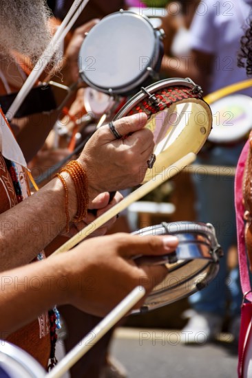 Tambourines and musicians during a carnival celebration in the streets of Brazil, Belo Horizonte,