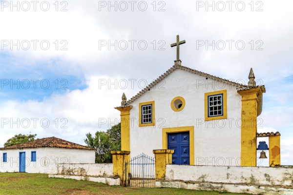 Old colonial-style house and church in a small village in the state of Minas Gerais, Minas Gerais,