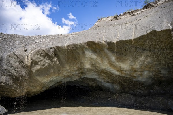 Meltwater at a glacier cave, underground glacier stream, Castner Glacier, Delta Range, Alaska