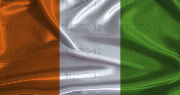 Ivory Coast flag with cloth textured background. National flag of Ivory Coast with realistic