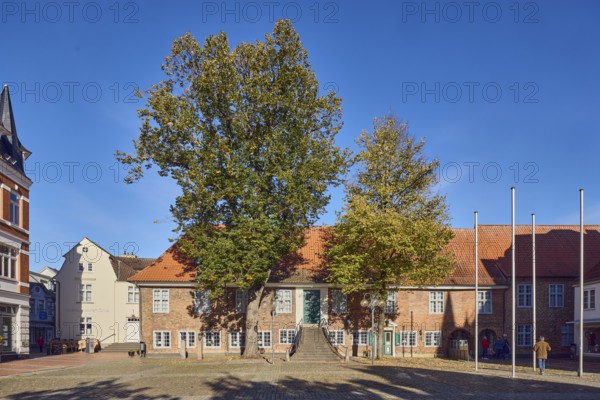 City museum, historic town hall, brick building, facade with windows, museum, staircase, square of
