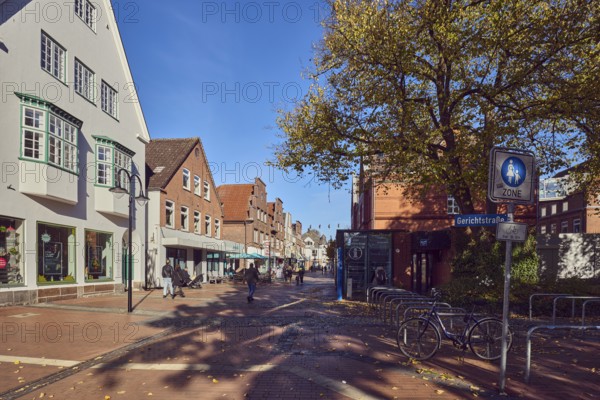 Pedestrian zone, houses, residential buildings and commercial buildings, brick houses, façade with