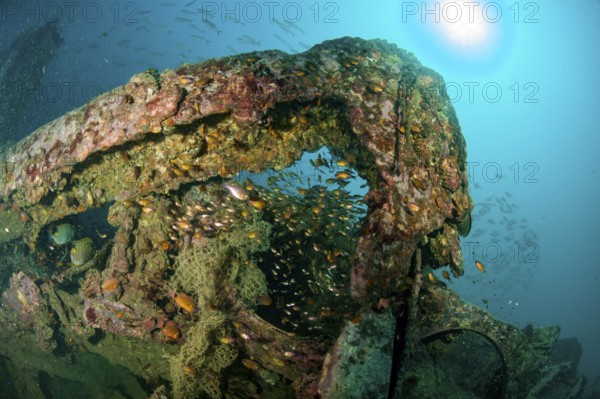 Underwater photo parts of former sunken tin excavator Boonsung wreck off the coast of seaside