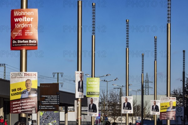 Mayor election in Böblingen. Election posters of OB candidates are hanging in front of the train