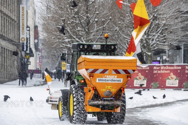Winter in Stuttgart. There is a closed blanket of snow in the city center. Winter cleaning service