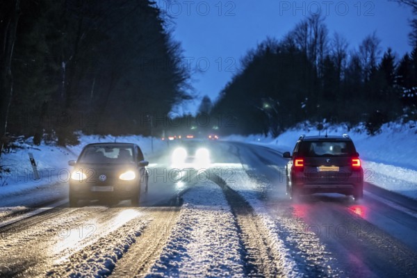 Country road with snow and slush Bergisches Land, near Marienheide, North Rhine-Westphalia, Germany