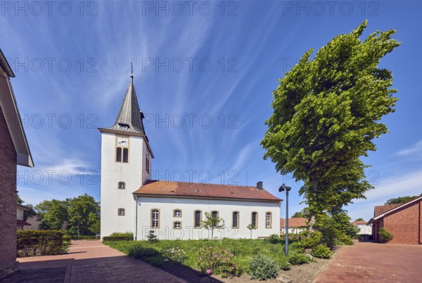 Ev. Church -Luth. parish of Vörden, church tower, general architecture, paving brick walkway, herb