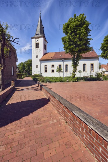 Ev. Church -Luth. parish of Vörden, church tower, general architecture, paving brick walkway,