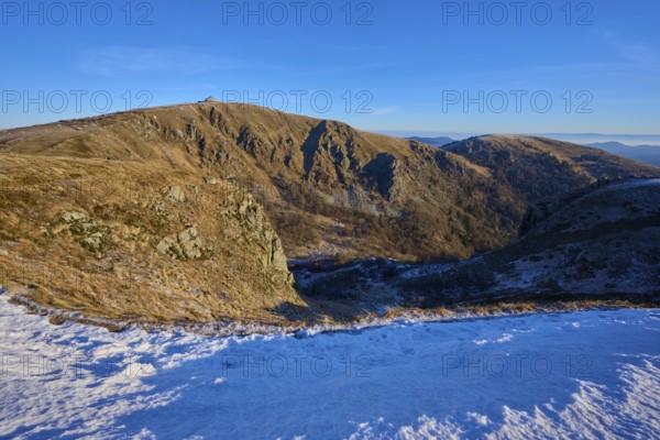 Snowy heights reveal vast valleys under clear skies and sunshine, winter, Route de Cretes, Hohneck,