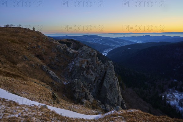 Rocky elevation with wide horizon at sunset, looking towards the Rhine Valley, viewpoint, La Gorge