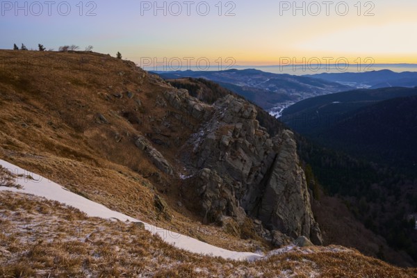 Rocky hill at sunset with a wide view, looking towards the Rhine Valley, viewpoint, La Gorge de