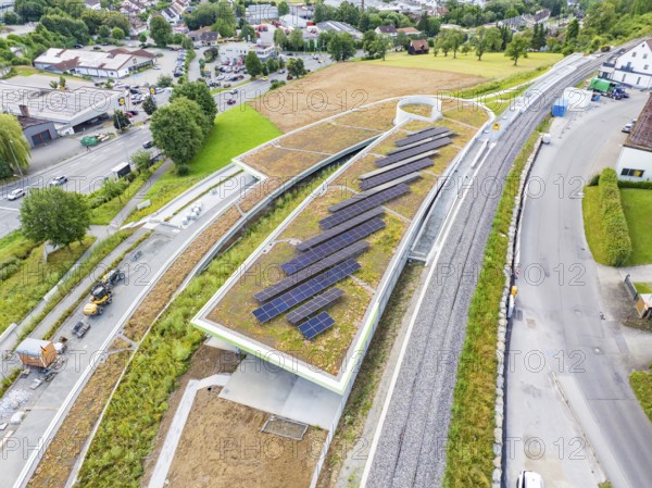 Modern solar roof construction in an urban environment, surrounded by infrastructure, new Park and