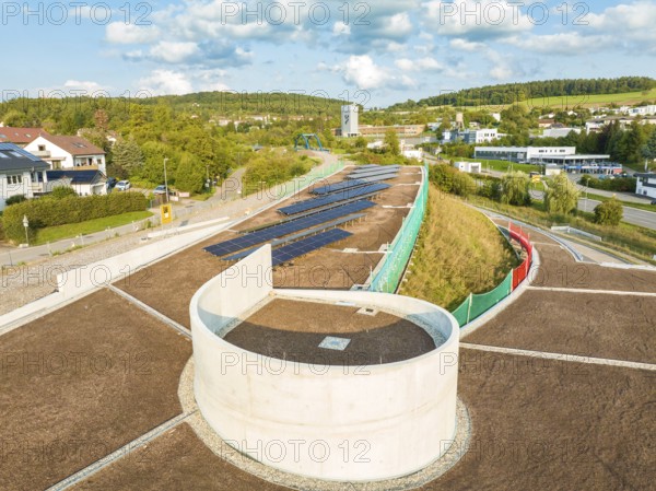 Solar panels on an architecturally designed roof with green barriers, new Park and Ride Calw